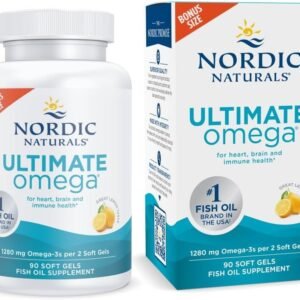 Bottle of Nordic Naturals Ultimate Omega lemon-flavored soft gels on a desk with a travel mug and keys — highlighting heart and brain support for active lifestyles.